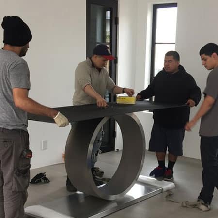 a team of Crystal Coast Moving preparing for a move